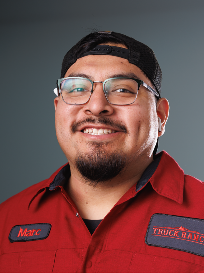 Service Technician Marc Cervantes in Truck Ranch Garage at Truck Ranch
